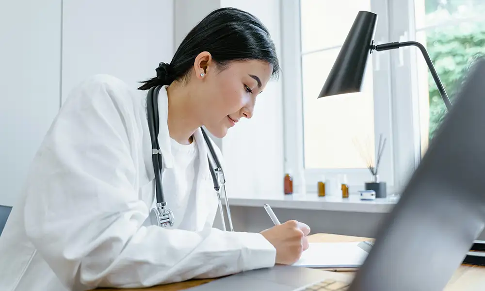 physician-at-desk.webp